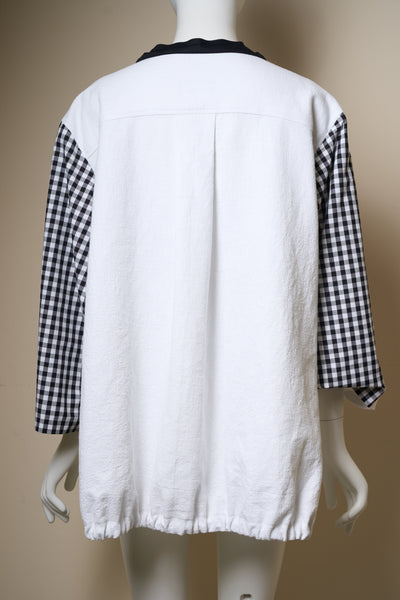 Designer-Bluse im angesagten Materialmix